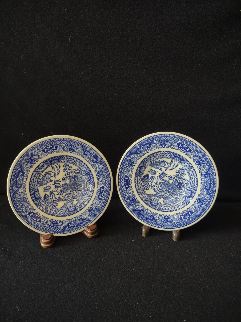 Vintage Royal China Willow Ware Blue White saucer set of 2 displayed on stands