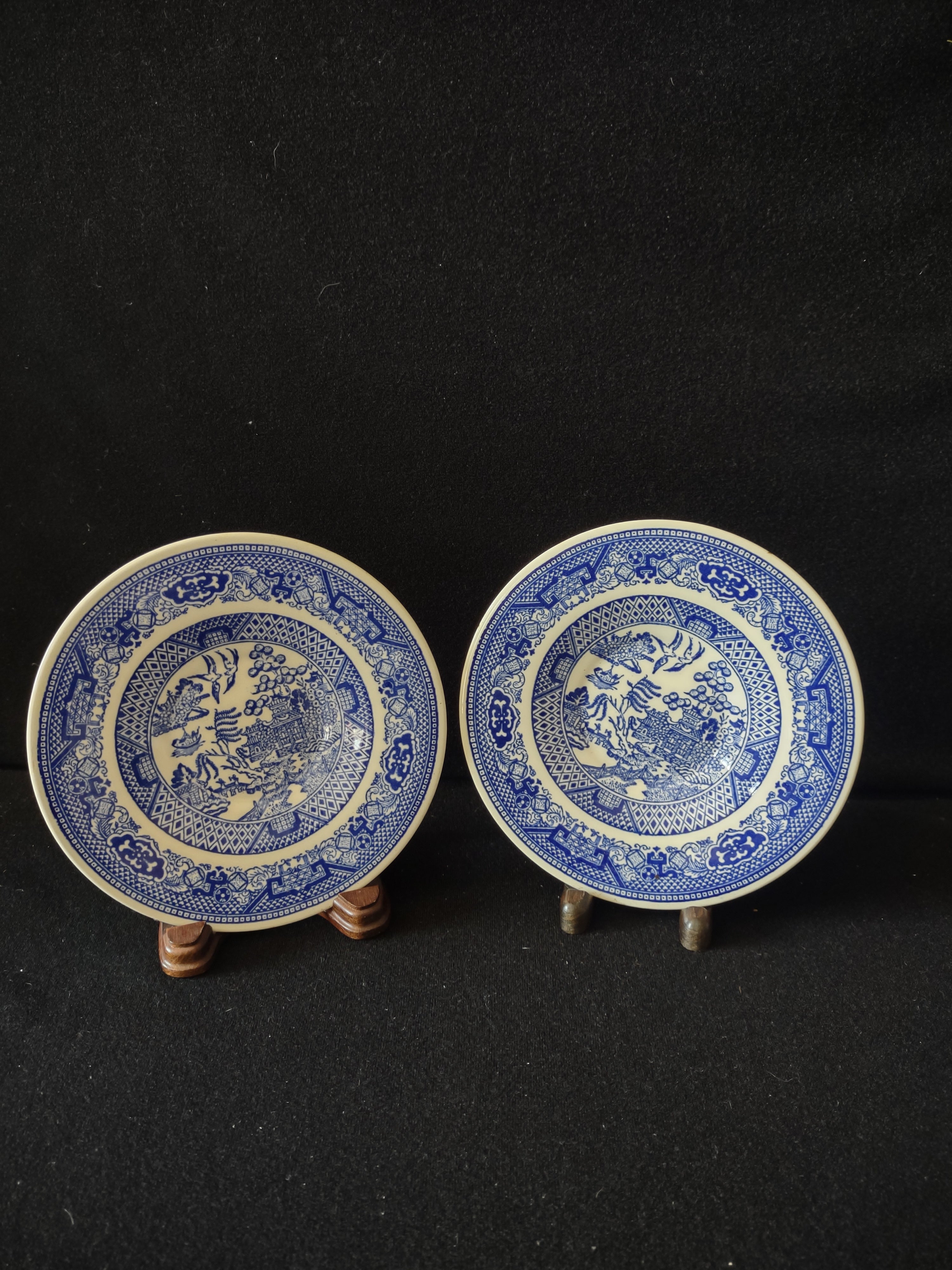 Vintage Royal China Willow Ware Blue White saucer set of 2 displayed on stands