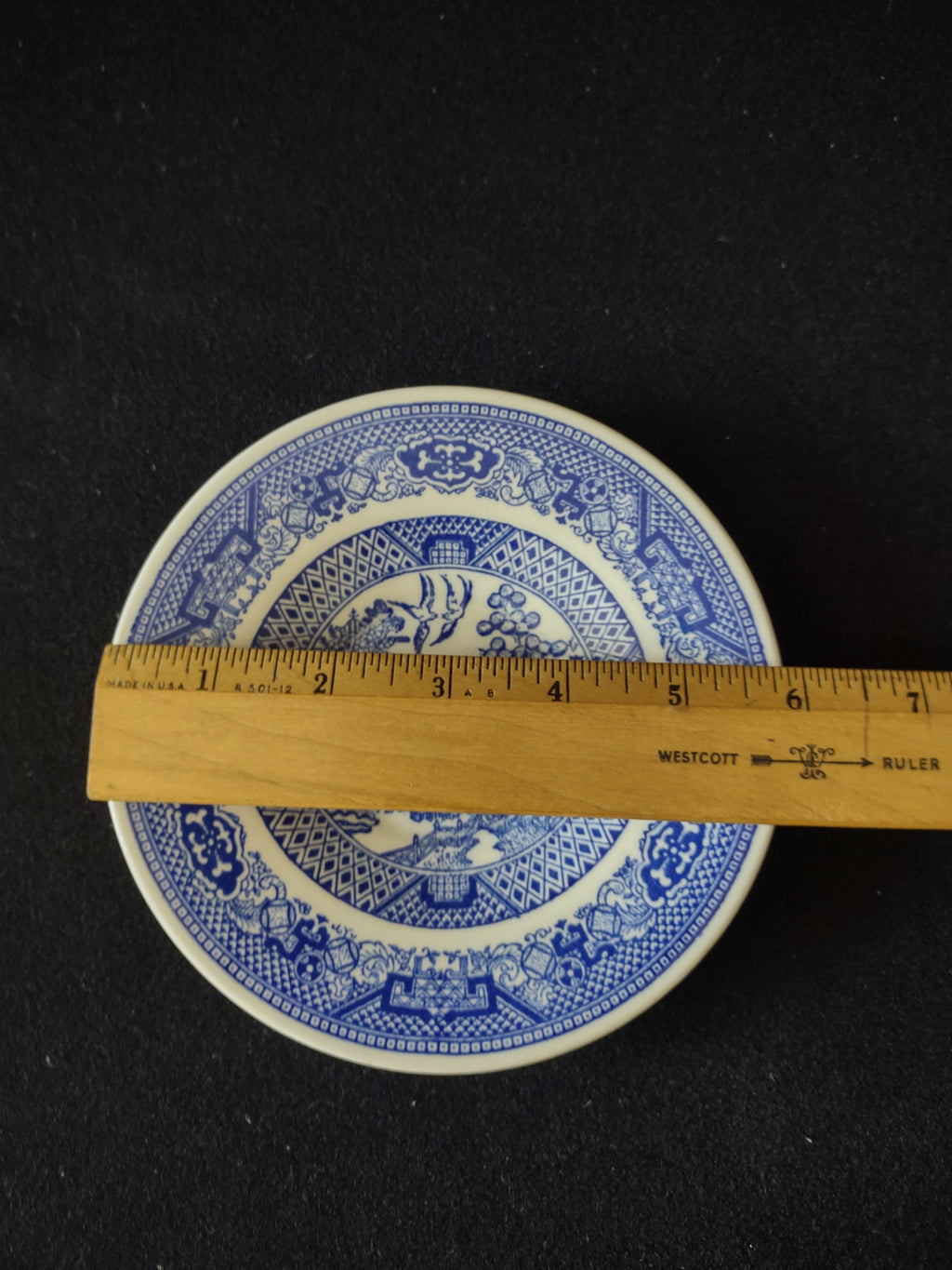 Vintage Royal China Willow Ware Blue White saucer set of 2 displayed on stands front view
