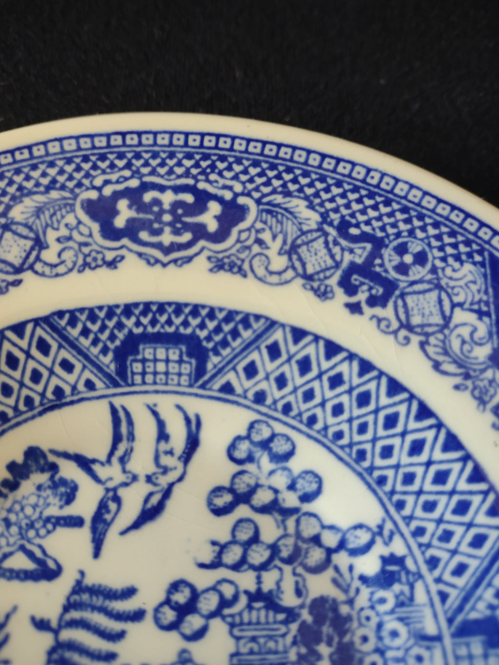 Royal China Willow Ware saucer with ruler showing approx 5 inch diameter
