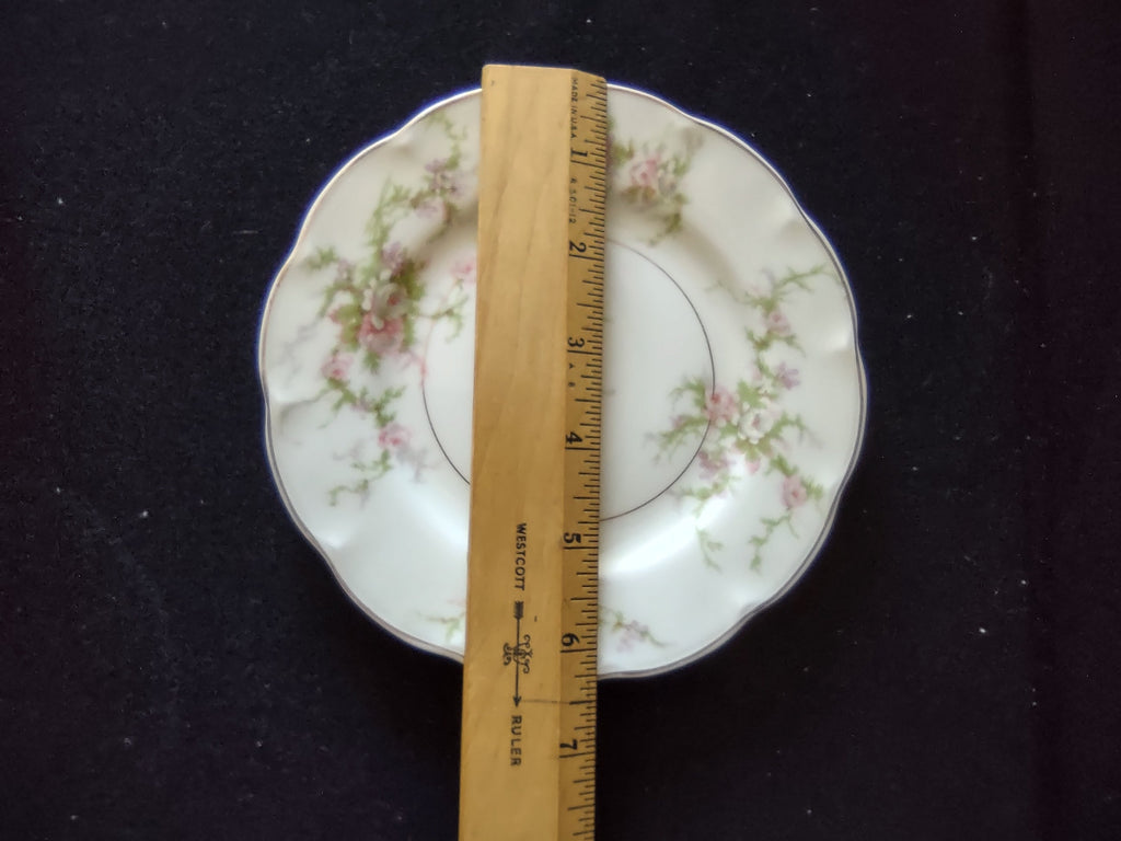 Theodore Haviland Rosalinde plate side detail with pink rose spray