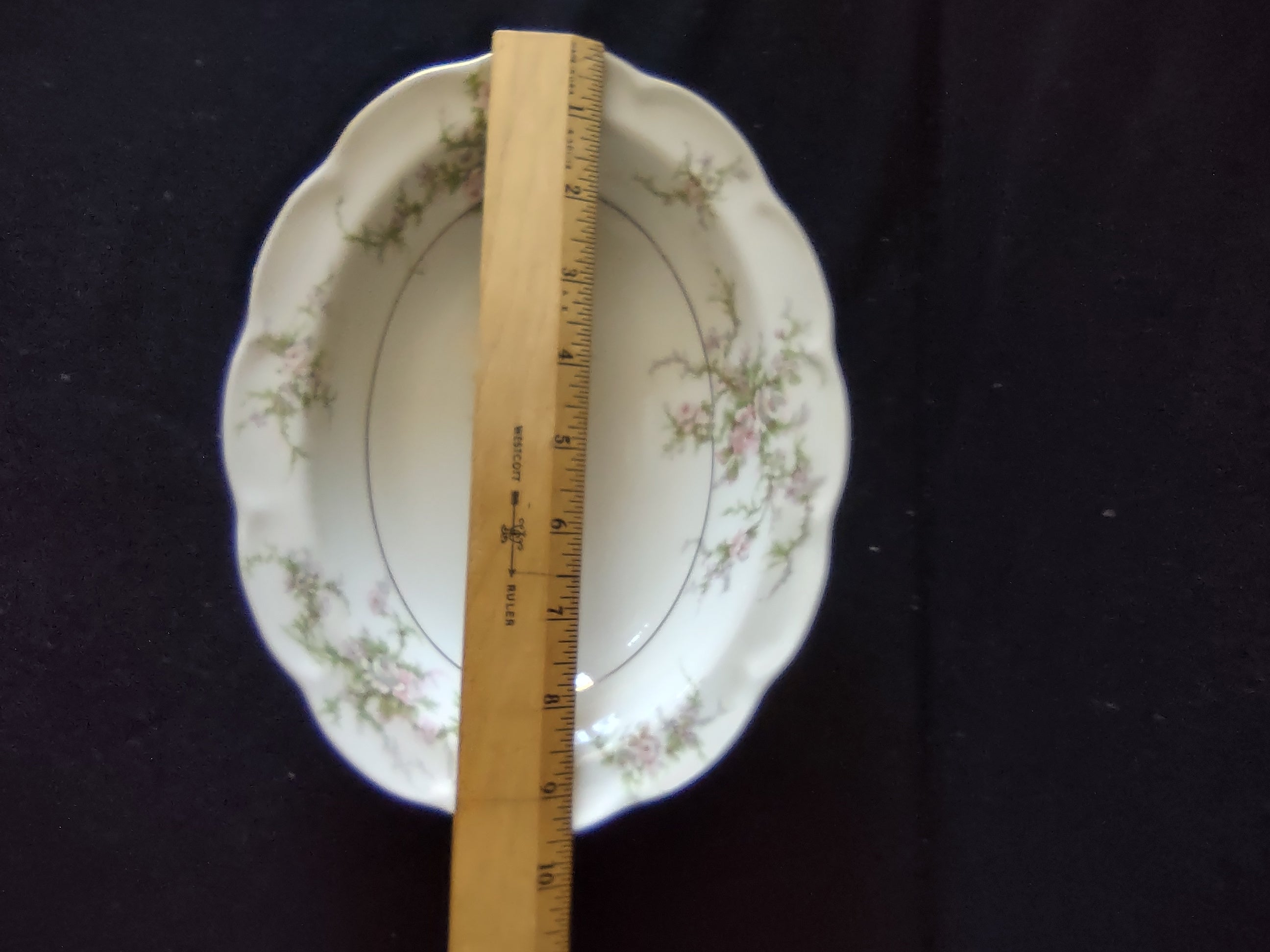 Theodore Haviland Rosalinde oval serving bowl top view showing full floral pattern and gold ring