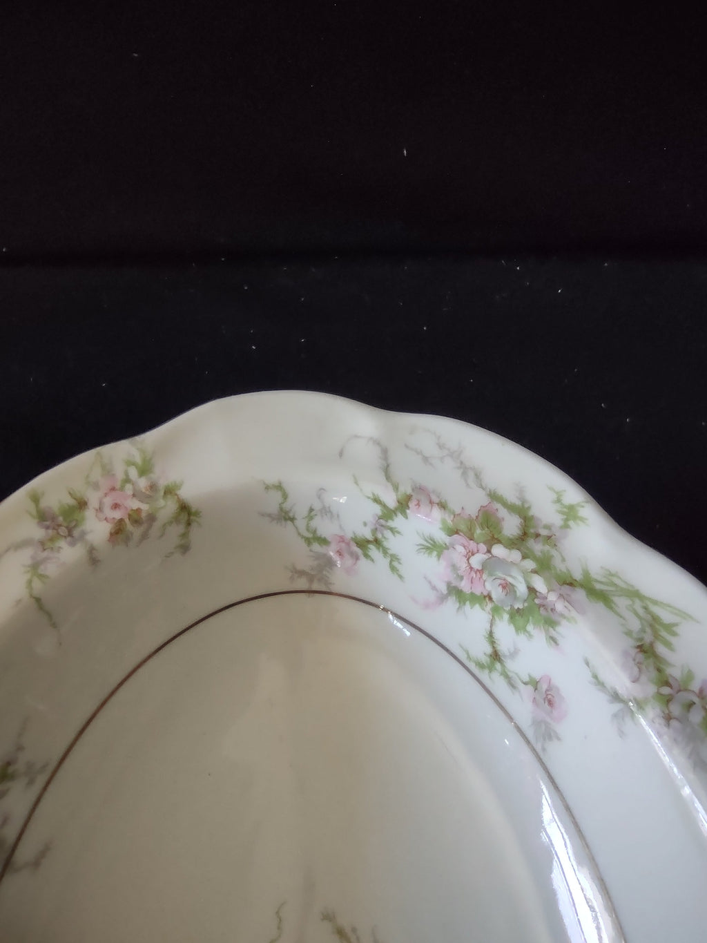 Theodore Haviland Rosalinde oval serving bowl with ruler showing approximately 9 inch length