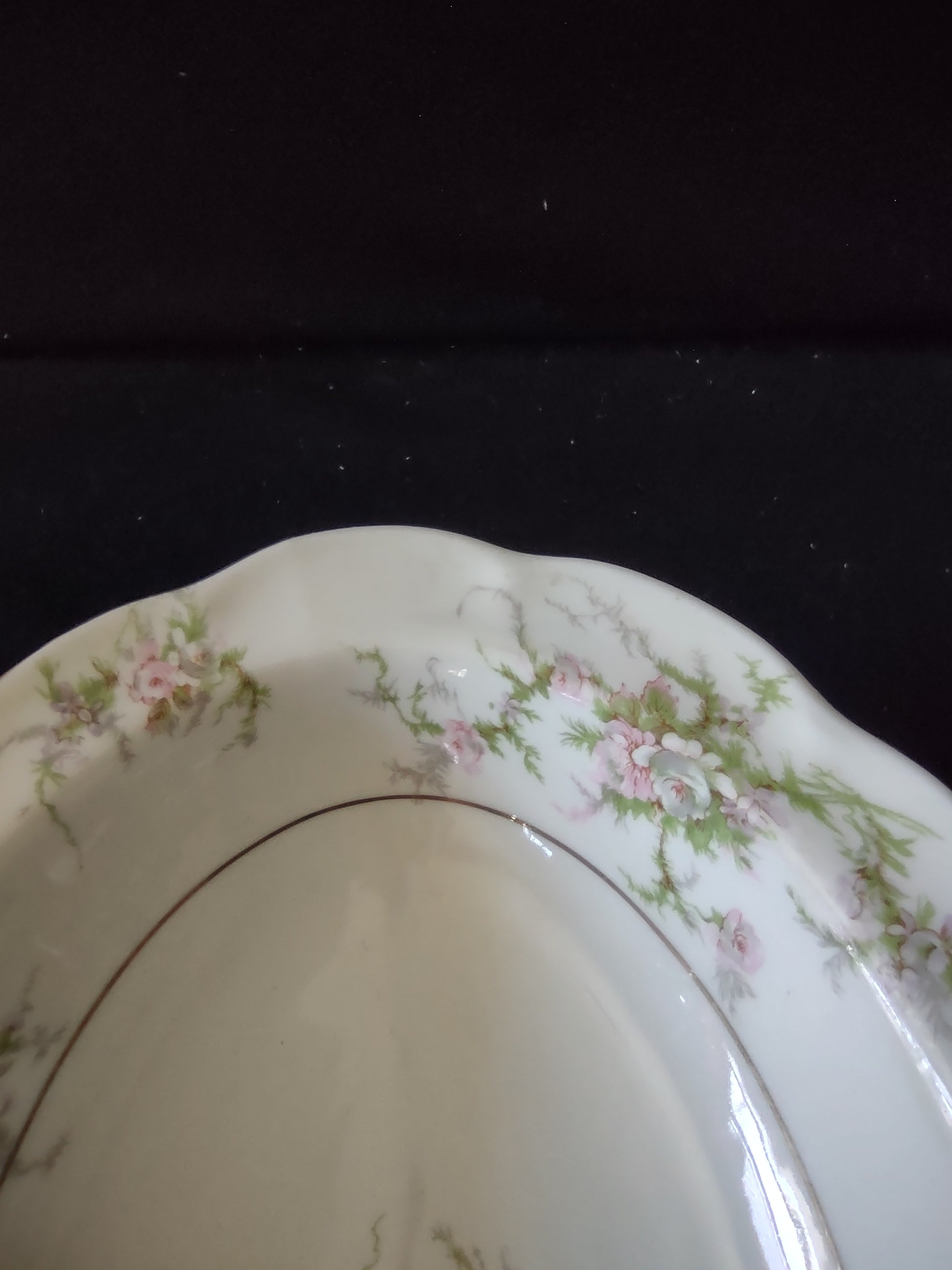 Theodore Haviland Rosalinde oval serving bowl with ruler showing approximately 9 inch length