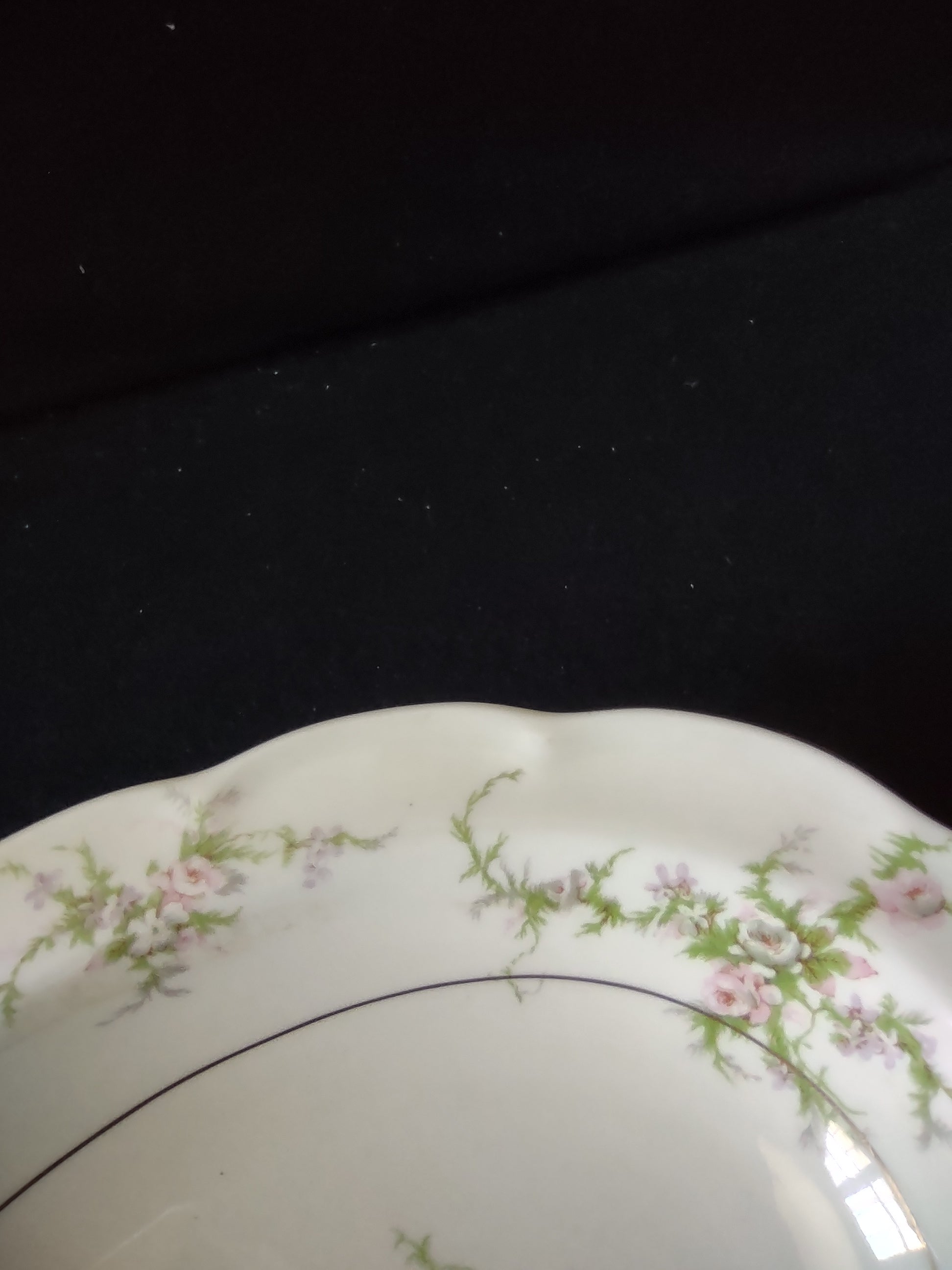 Theodore Haviland Rosalinde serving bowl showing scalloped edge and pink floral decoration