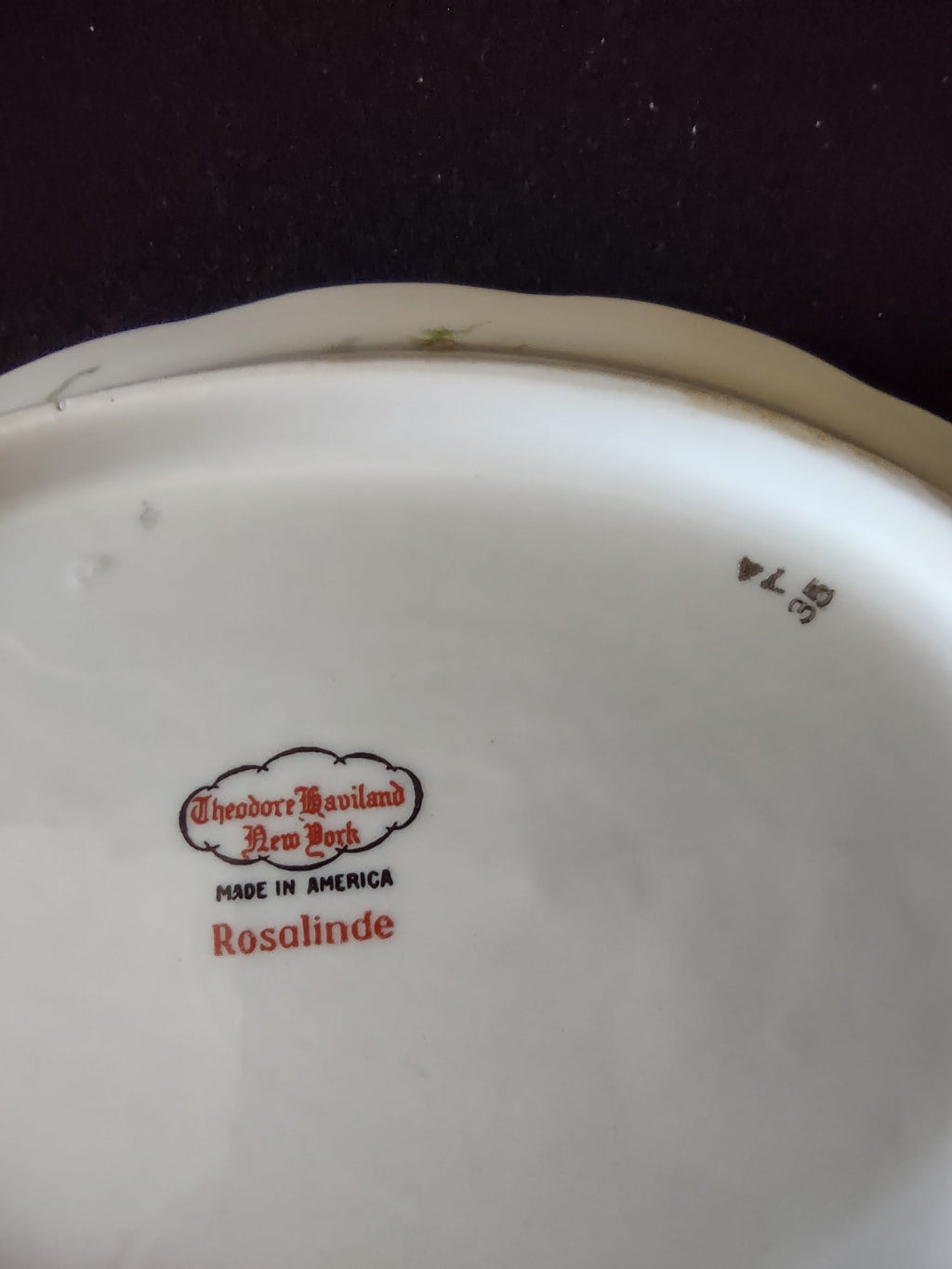 Theodore Haviland Rosalinde serving bowl three-quarter view showing form and floral pattern