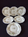 Theodore Haviland Rosalinde pink floral plates set of 6 overhead view showing scalloped rims