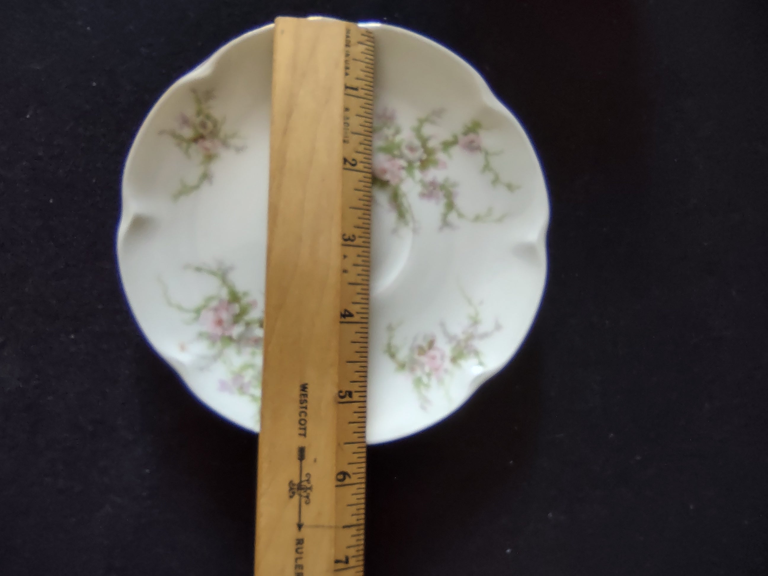 Theodore Haviland Rosalinde saucer interior with pink rose spray
