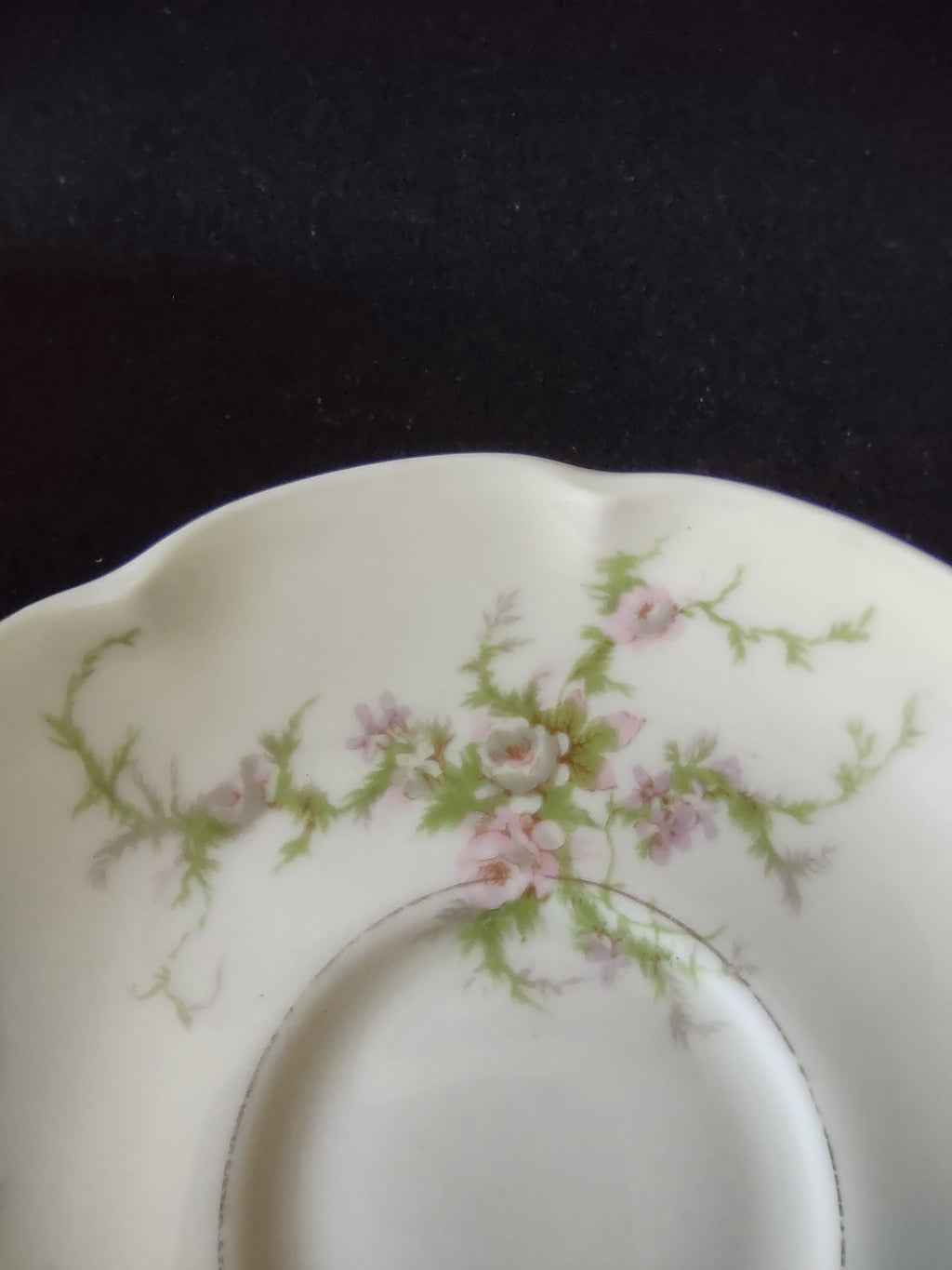 Theodore Haviland Rosalinde teacup interior with gold rim and floral detail