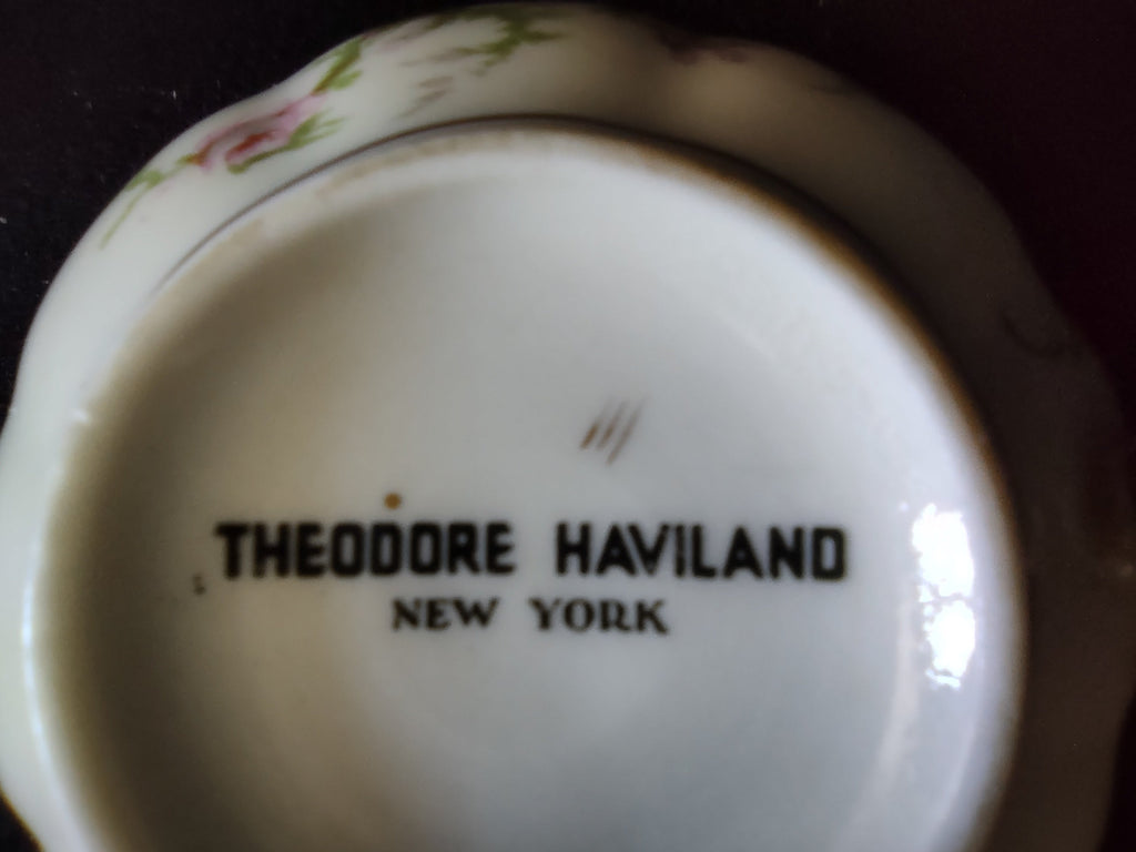 Theodore Haviland teacup bottom showing backstamp and gold handle