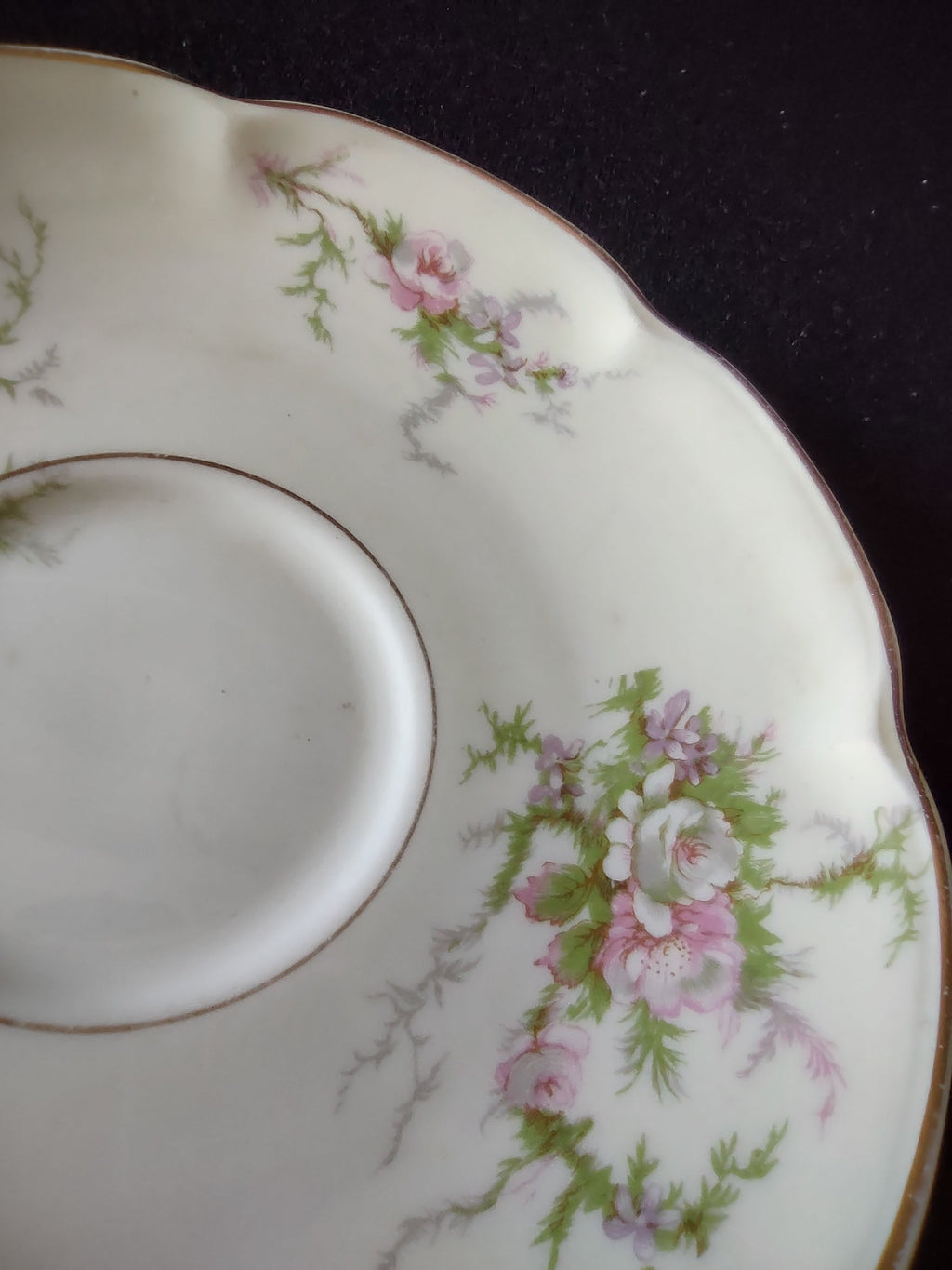 Vintage Theodore Haviland Rosalinde teacup side view with gold trim