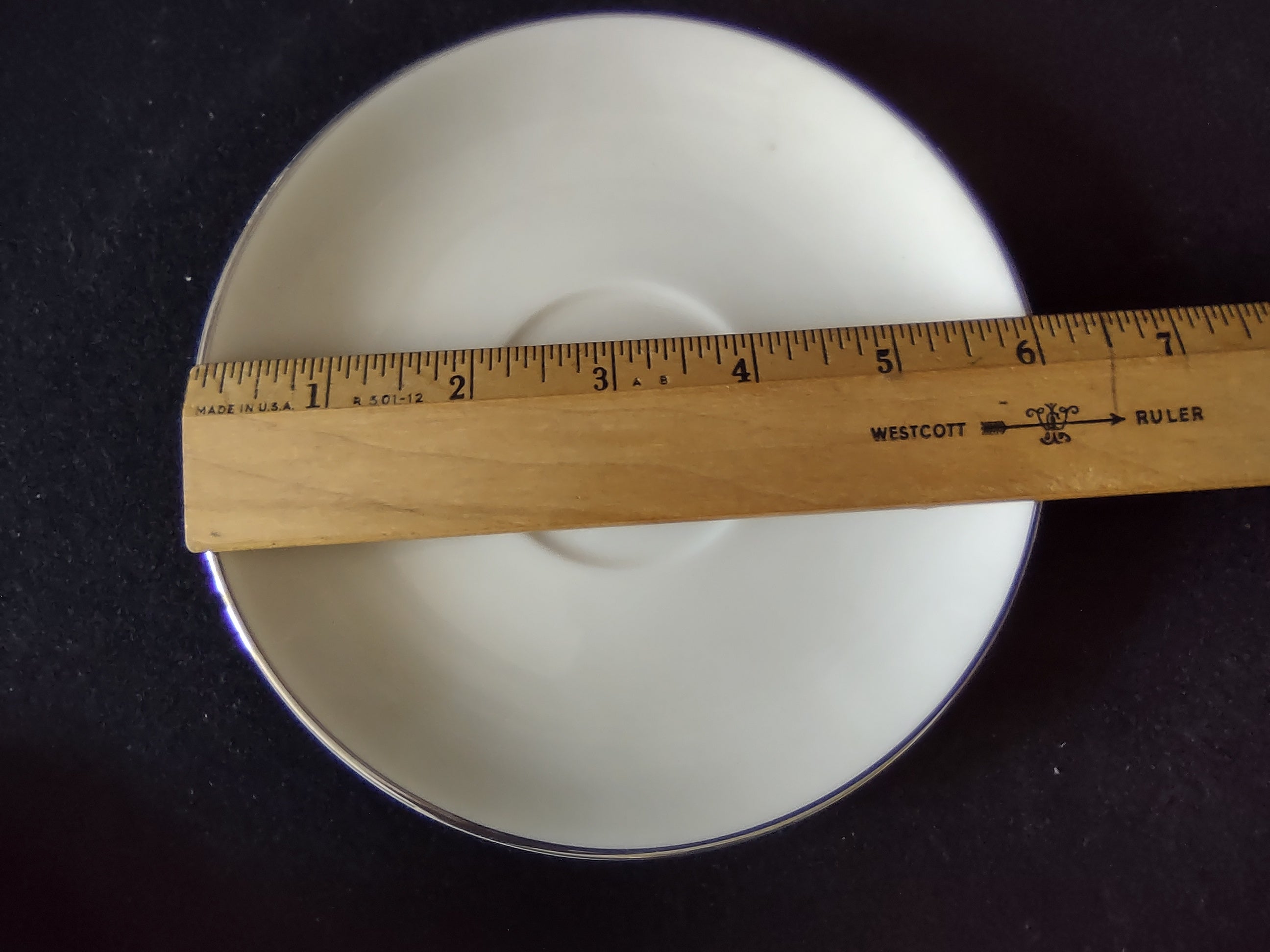 Flintridge China saucer showing platinum rim detail