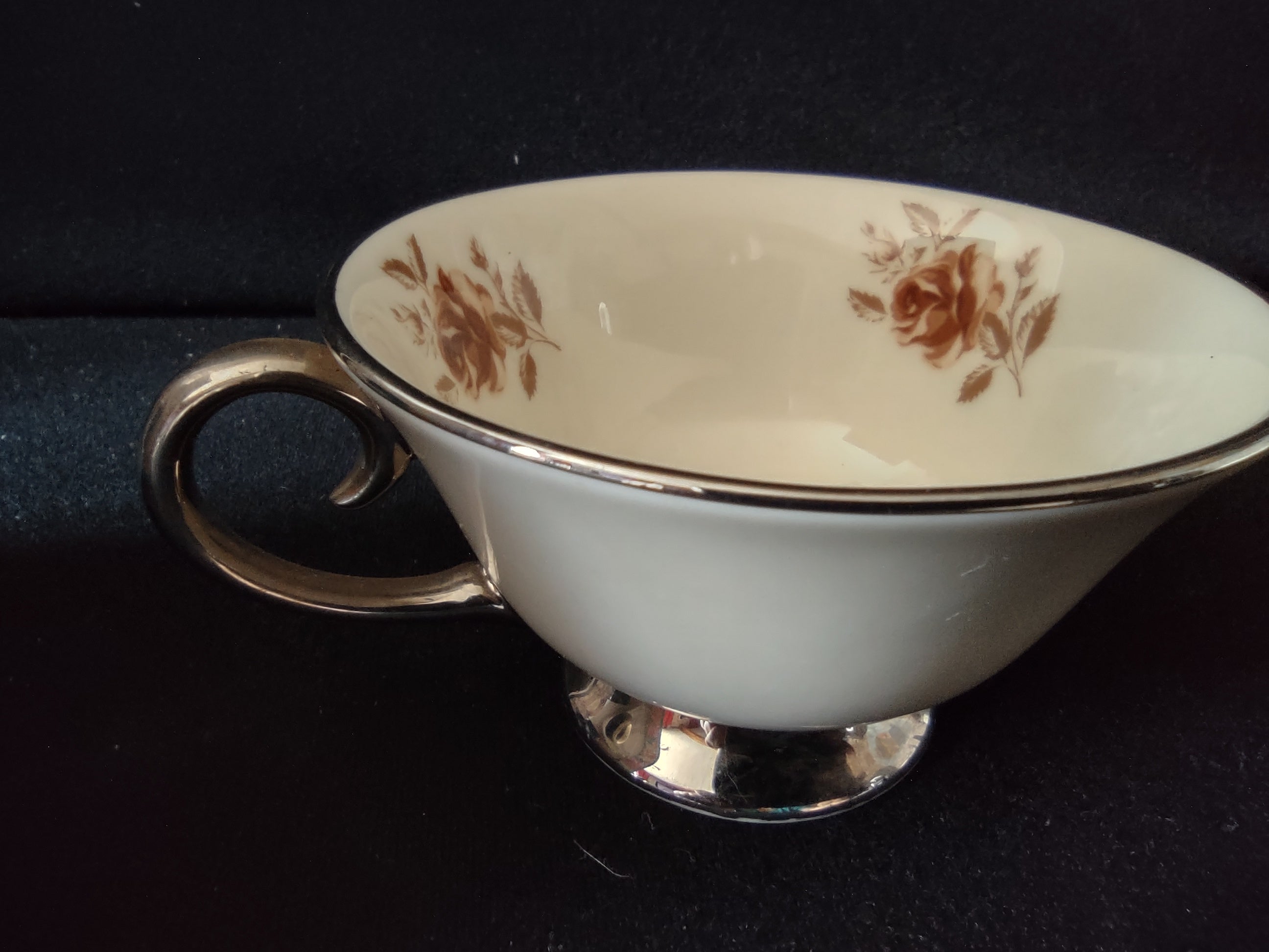 Flintridge China Brown Rose cup interior overhead view showing rose motif and discoloration