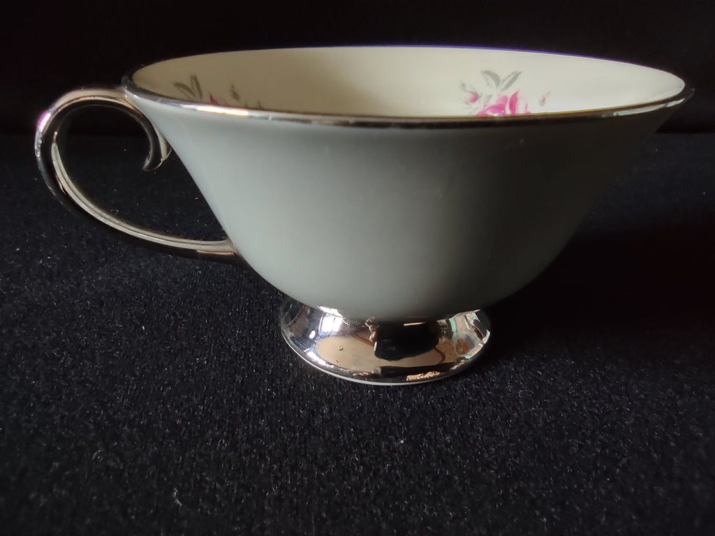 Flintridge China teacup interior with pink rose pattern