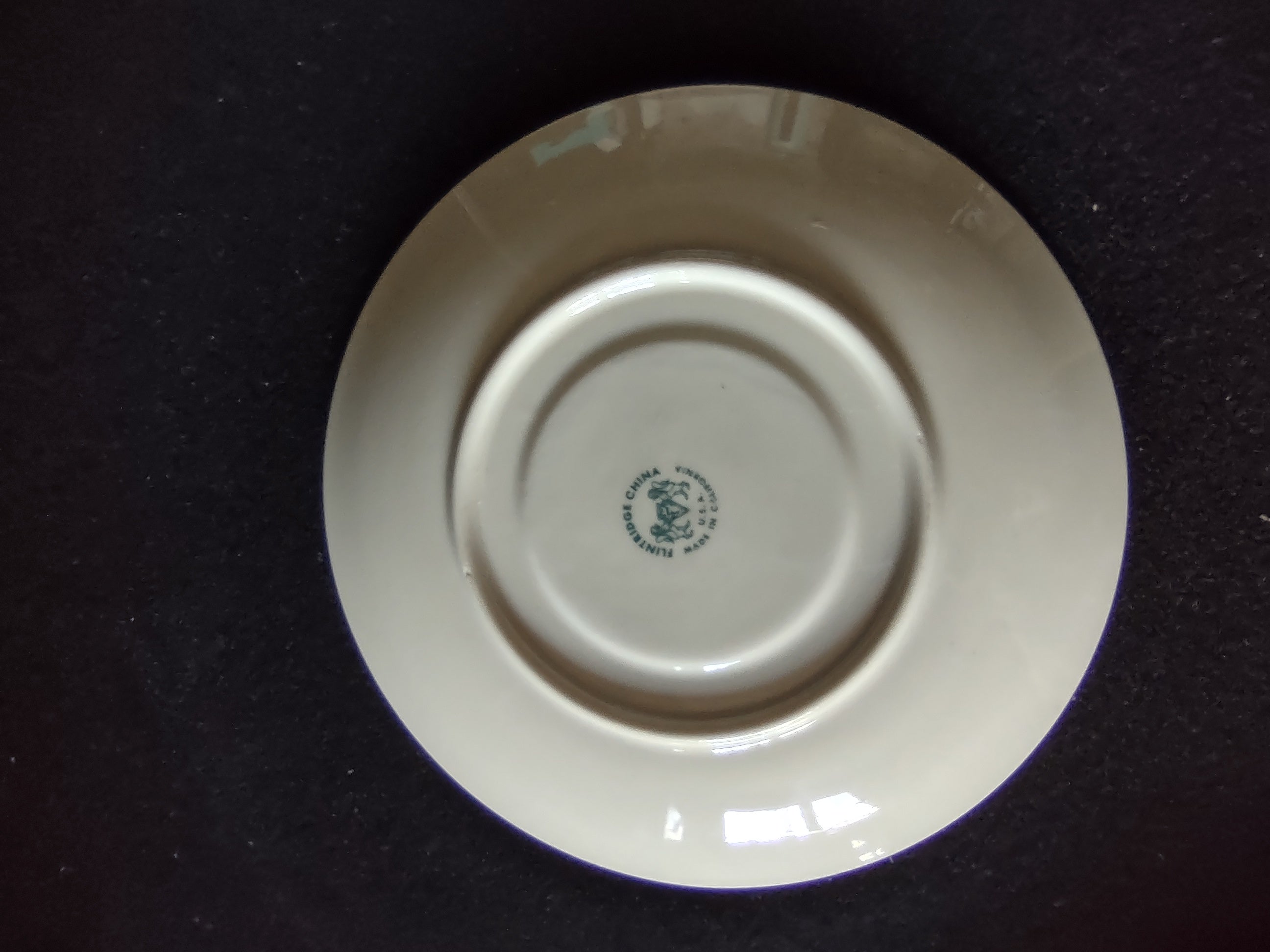 Flintridge China saucer angled side view with platinum rim