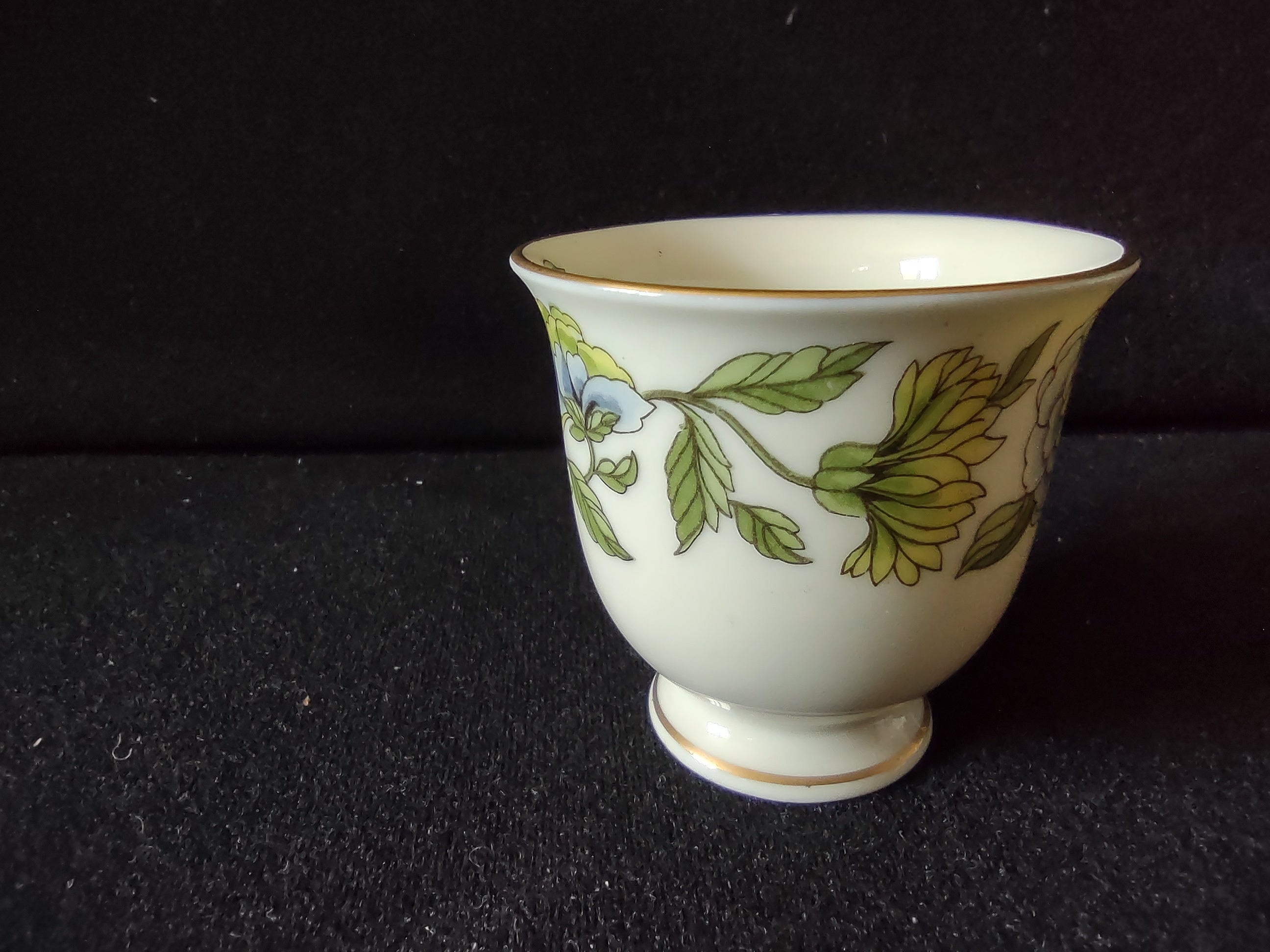 Castleton China blue peony floral teacup interior view showing bud motif and gold rim