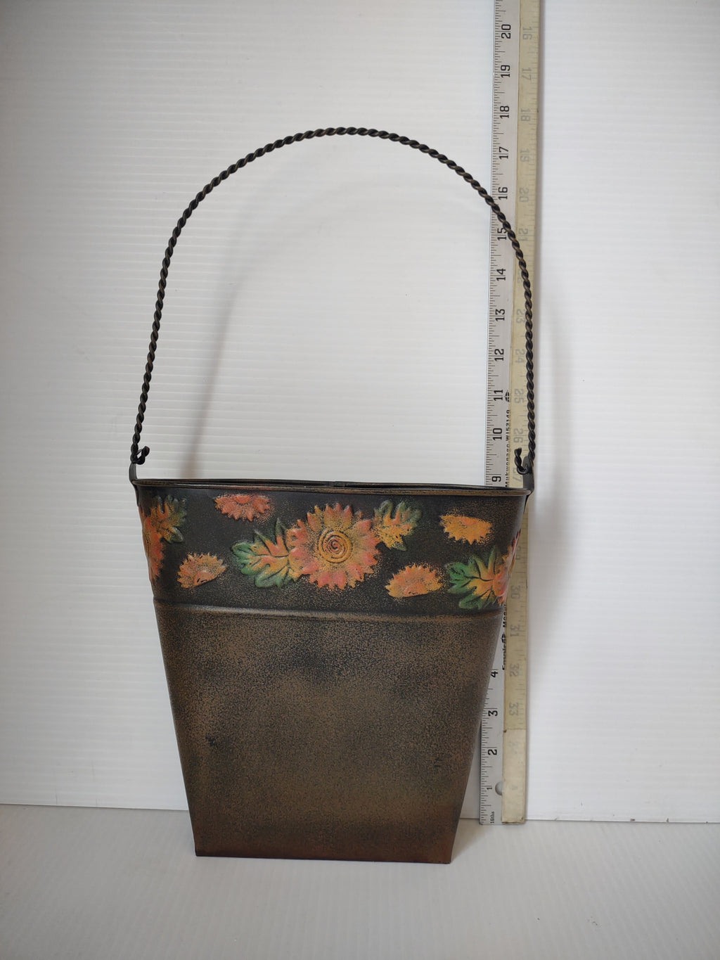 Vintage dark bronze metal tole bucket with hand painted sunflowers and twisted wire bail handle, approx 9 inches tall