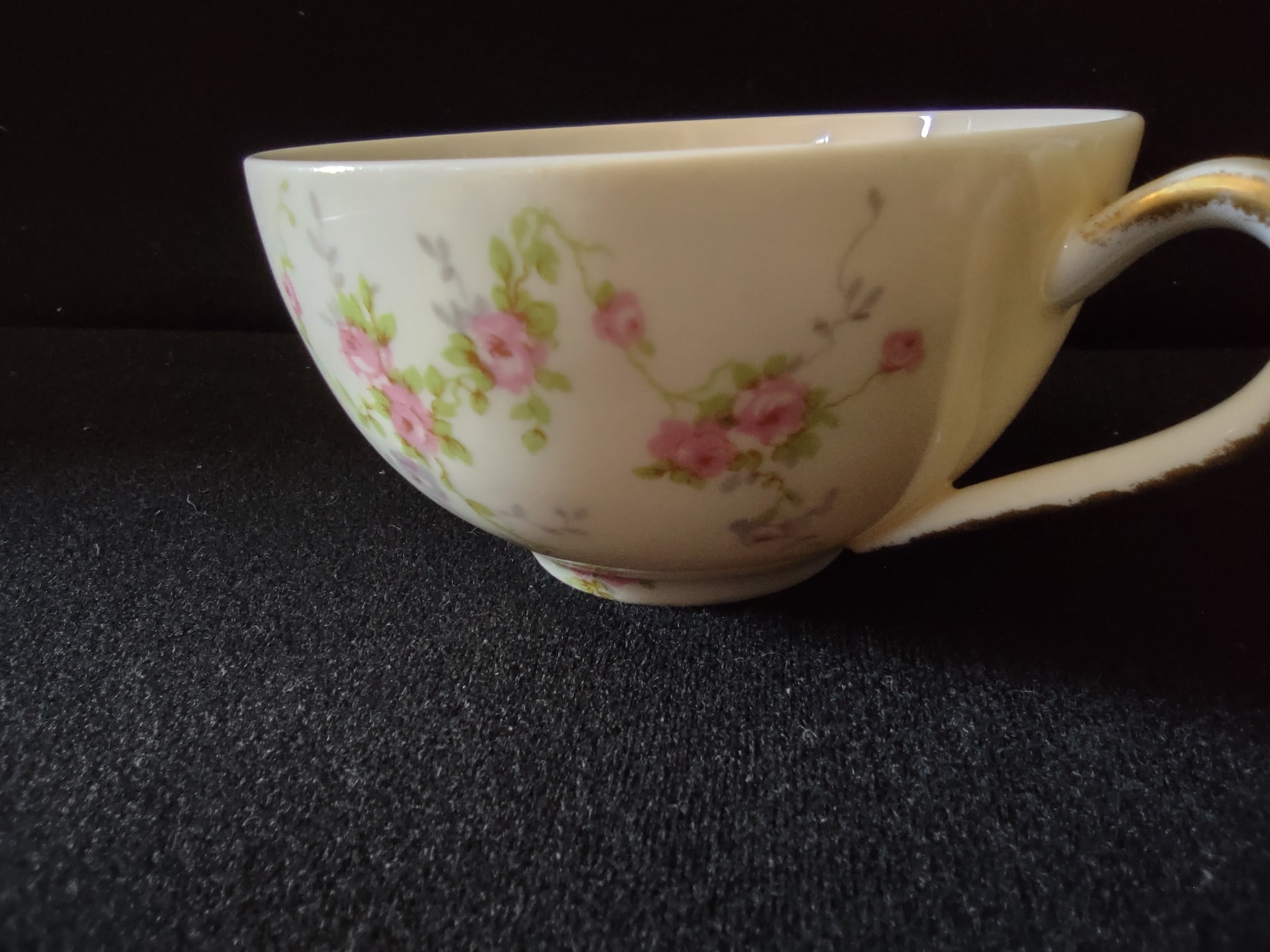 Theodore Haviland Pink Spray teacup interior showing discoloration