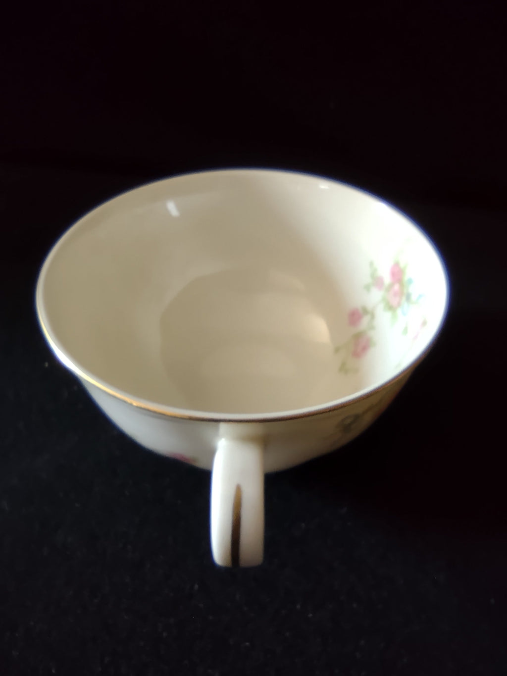 Vintage Theodore Haviland New York pink rose gold rim teacup side view