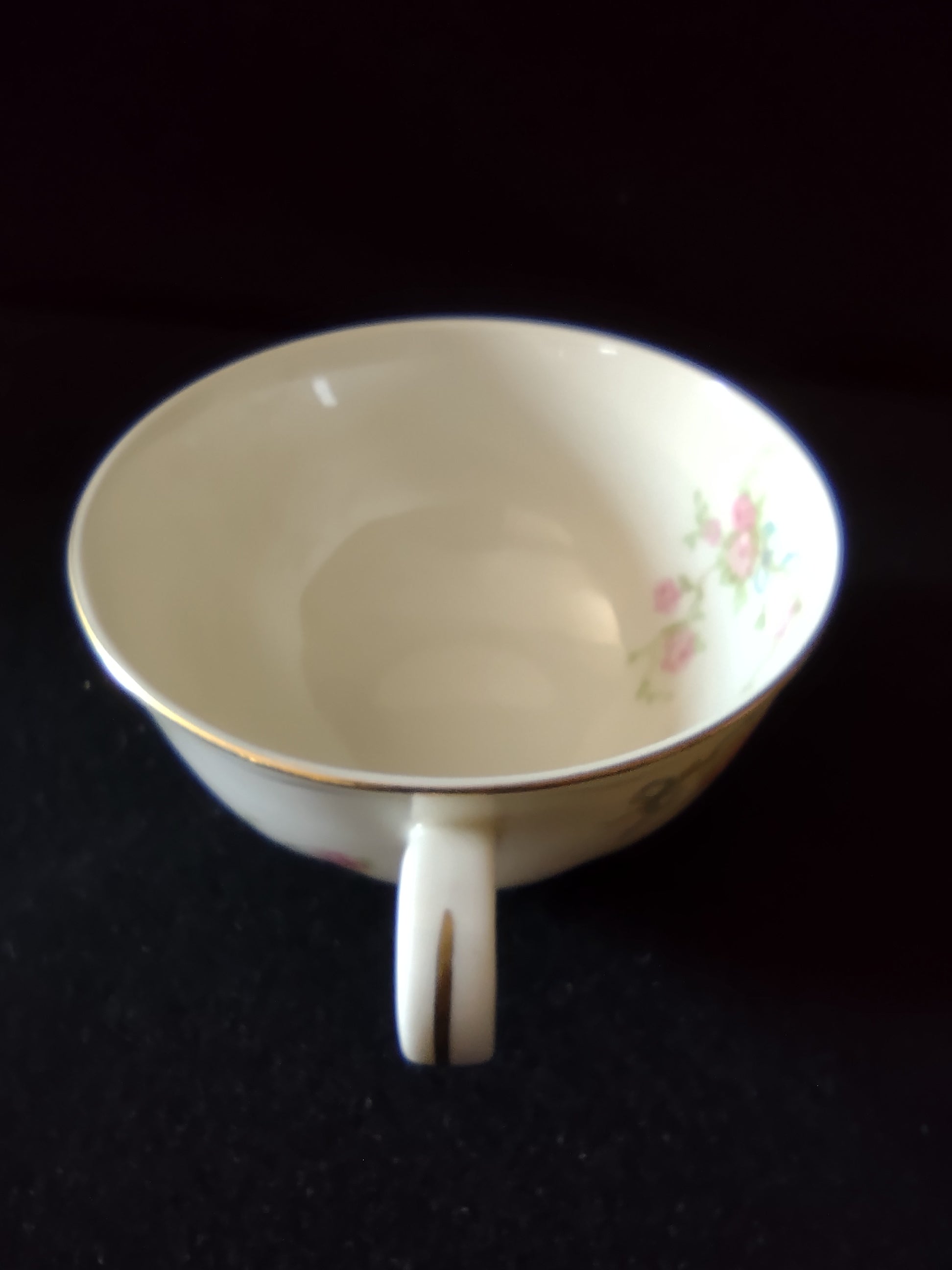 Vintage Theodore Haviland New York pink rose gold rim teacup side view