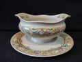 Vintage Sovereign China floral gold gravy boat with attached underplate - front view