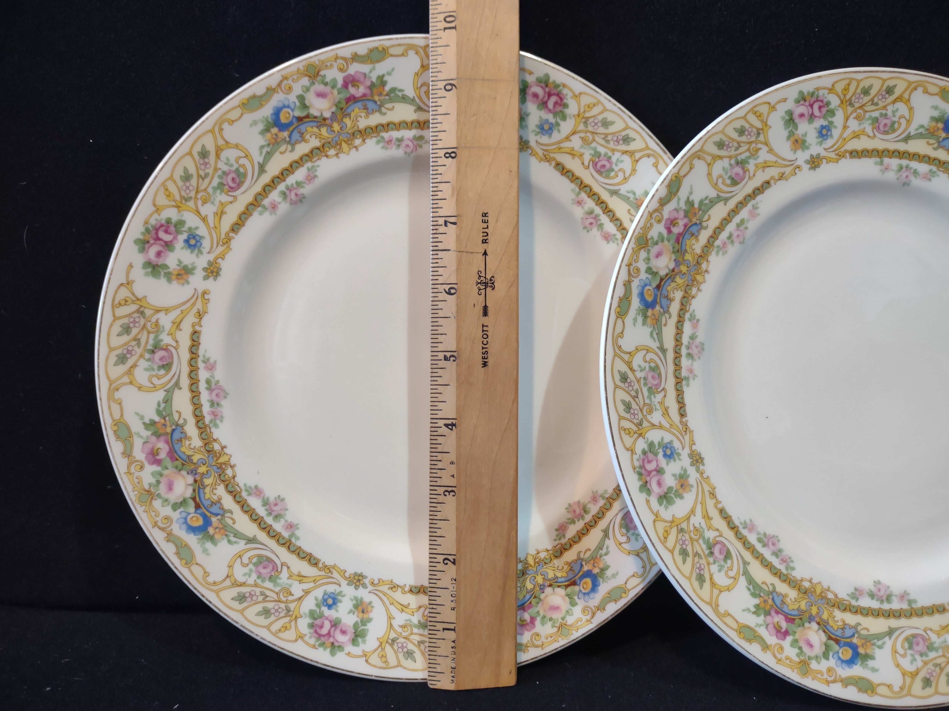 Vintage Syracuse China Opco USA Rose Marie plate - size measurement with ruler showing approx 9 inches diameter