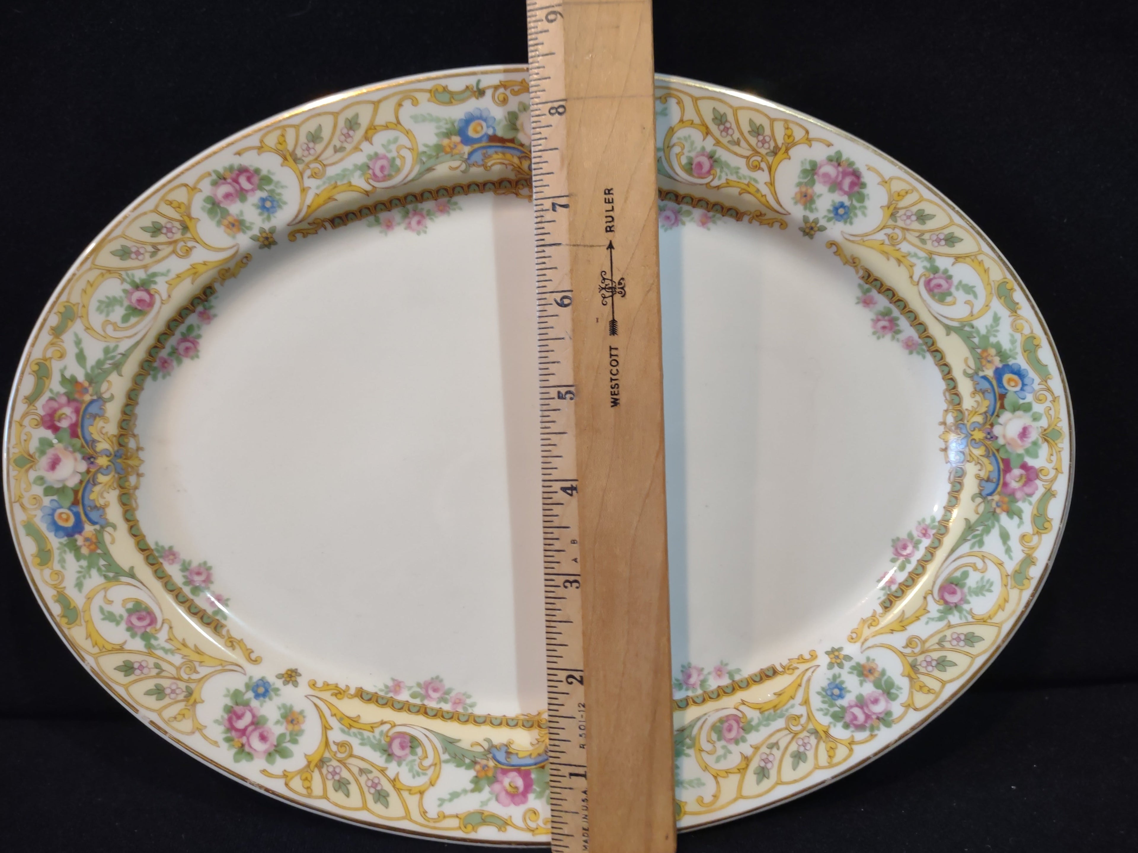 Vintage Syracuse China Rose Marie oval serving platter - vertical measurement showing approx. 8.5 inches tall