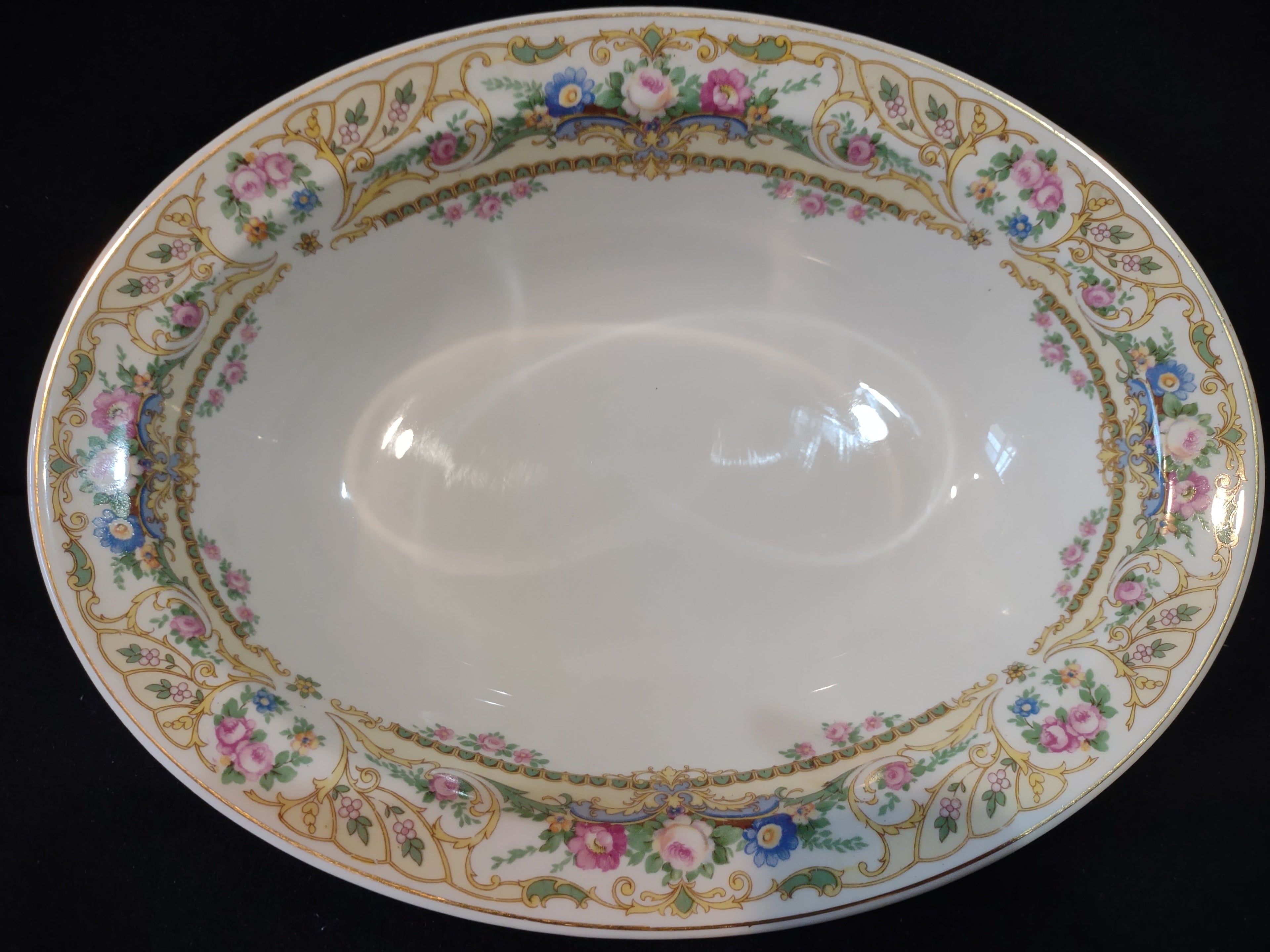 Vintage Syracuse China Rose Marie oval vegetable bowl - width measurement showing approx. 7 inches