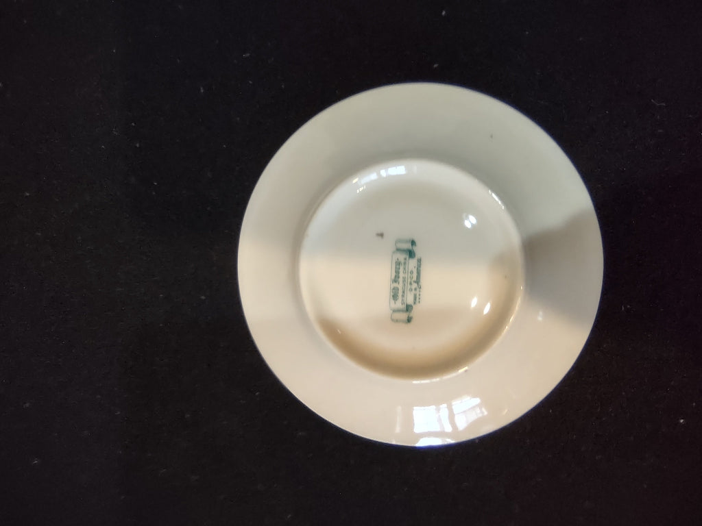 Syracuse China cobalt blue saucer floral detail