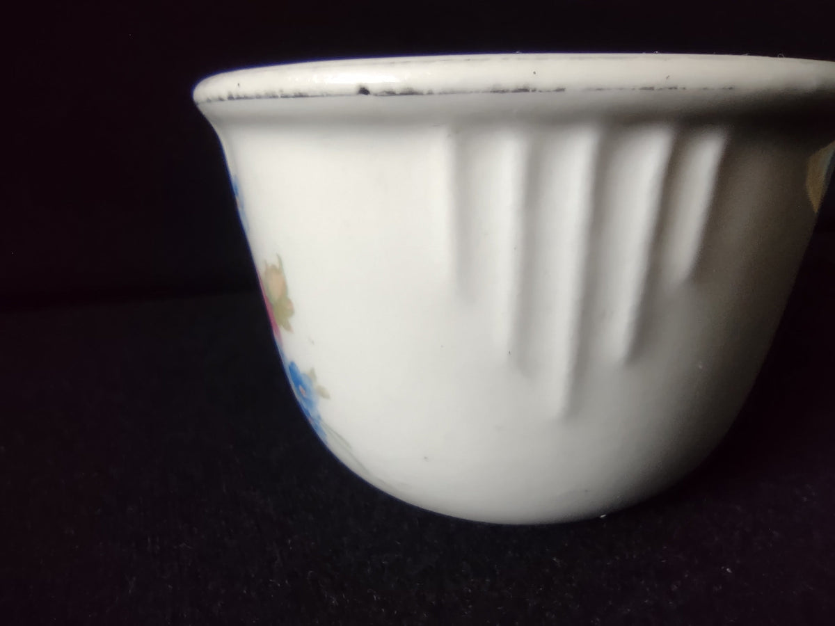 Vintage Floral Ribbed Cup - closeup of orange red poppy with purple center pattern