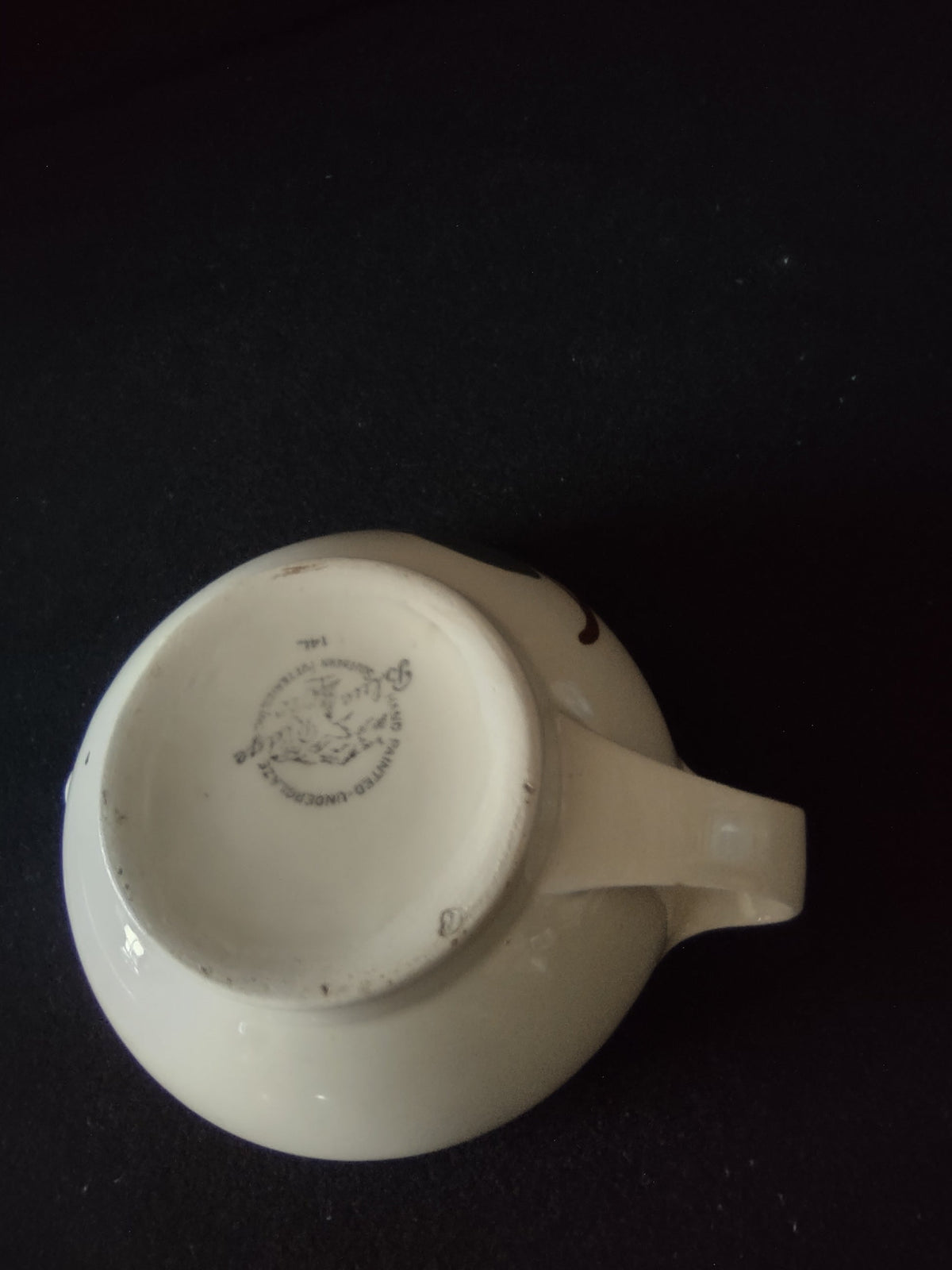Vintage Blue Ridge Southern Potteries off-white gravy boat - side view with ruler