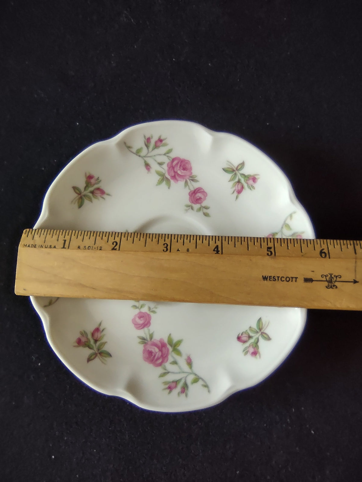 Theodore Haviland Delaware saucer with ruler showing approximately 6 inch diameter