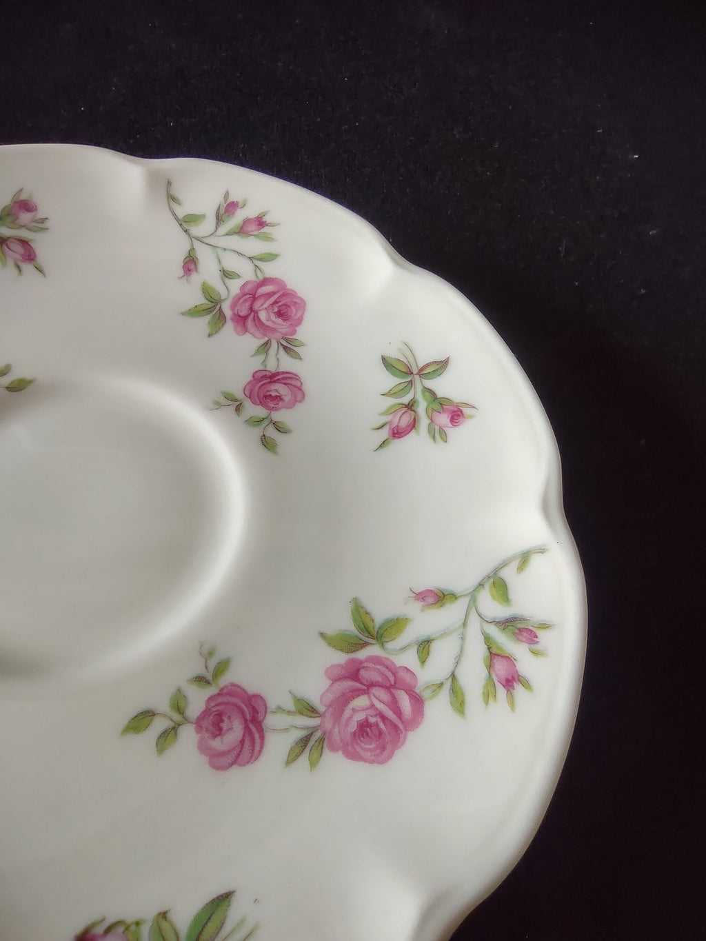 Theodore Haviland Delaware saucer detail showing pink rose and bud pattern