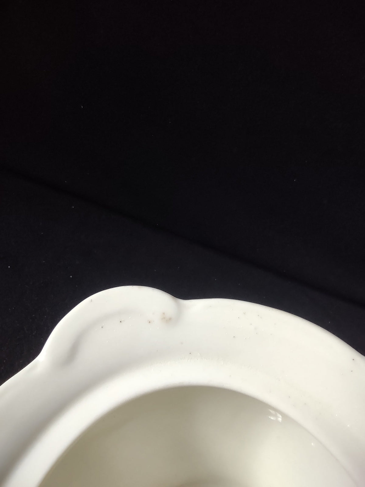 Top-down interior view of sugar bowl showing off-white glaze and tab handles