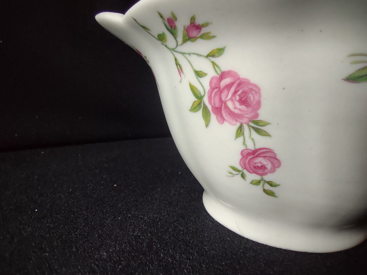 Additional view of sugar bowl with lid showing rose pattern detail