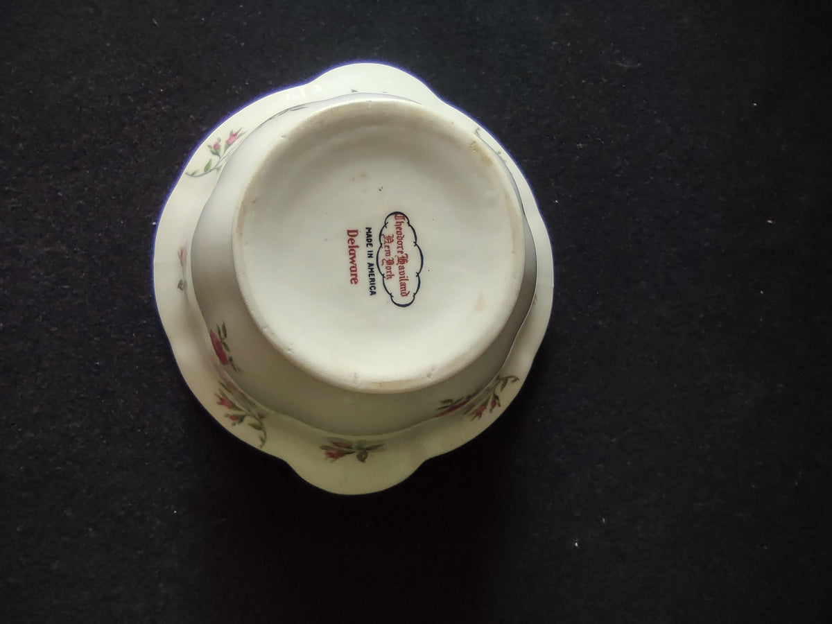 Sugar bowl with lid showing full assembled piece from slight angle