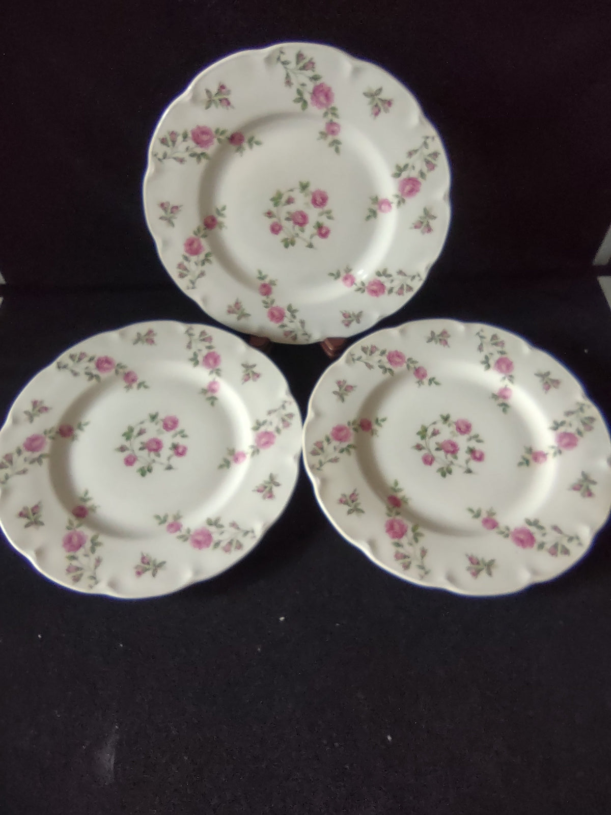 Theodore Haviland New York Delaware plate showing scattered pink rosebud border pattern on white