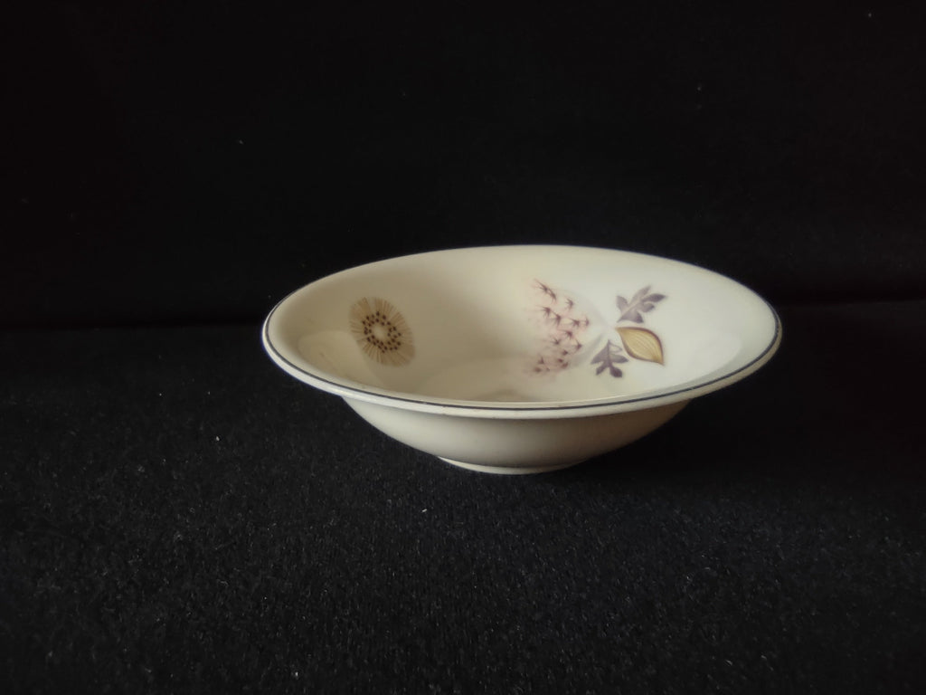 Top view of Theodore Haviland New York Meadow Lace saucer with ruler showing approximately 6 inch diameter, featuring burgundy starburst medallions and berry spray motif on white ground