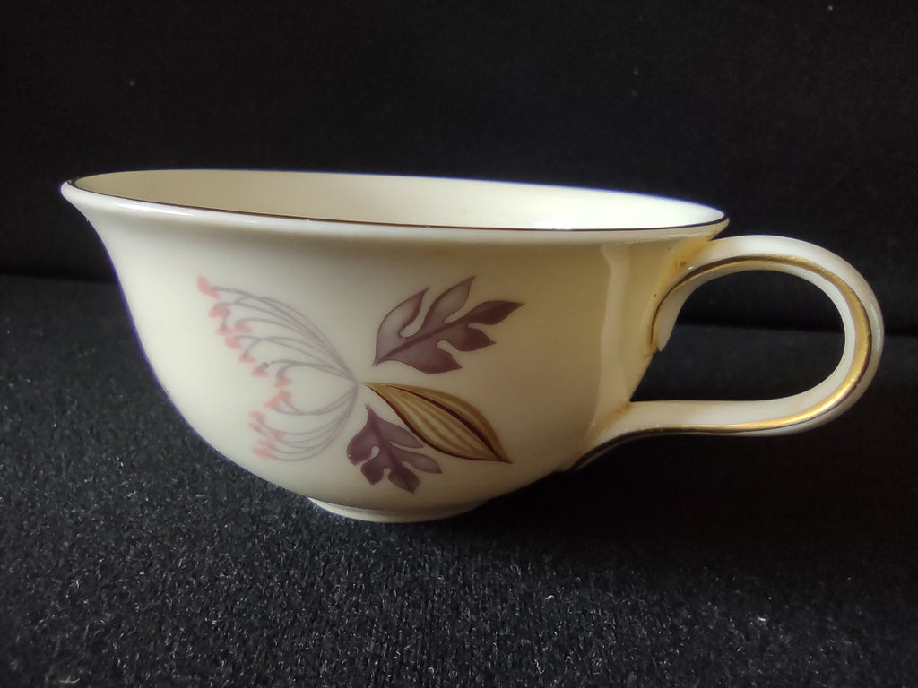 Lenox vintage cup and saucer pair showing floral pattern — pink bloom, olive and gray leaves, gray daisy accents