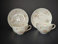 Set of 2 Theodore Haviland Touraine teacup and saucer sets with scattered pink rose sprigs
