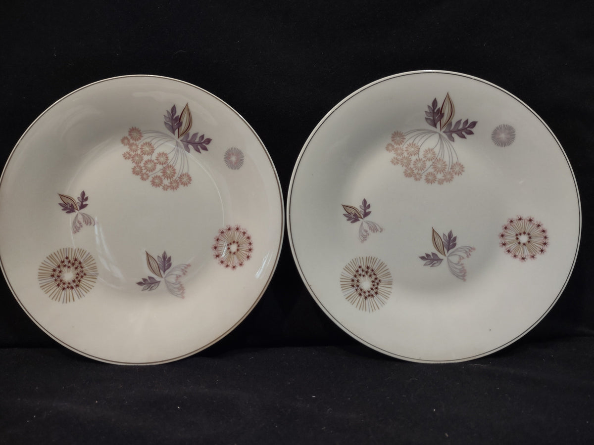 Vintage Theodore Haviland NY Meadow Lace plates set of 4, purple floral and starburst motif, platinum rim, front view