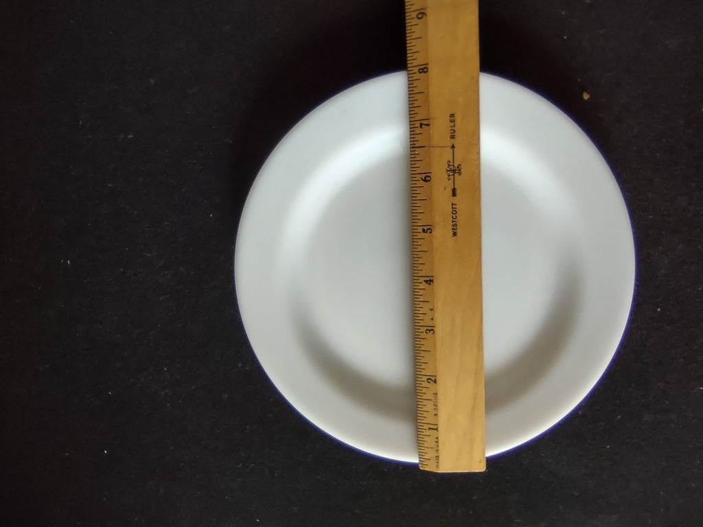 Vintage white porcelain plates set of 2, front view on display stand and flat