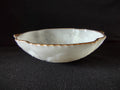 Vintage white embossed grape and leaf plate with gold rim - overhead view