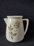 Top view of vintage ACv USA off-white ceramic pitcher showing interior with age discoloration