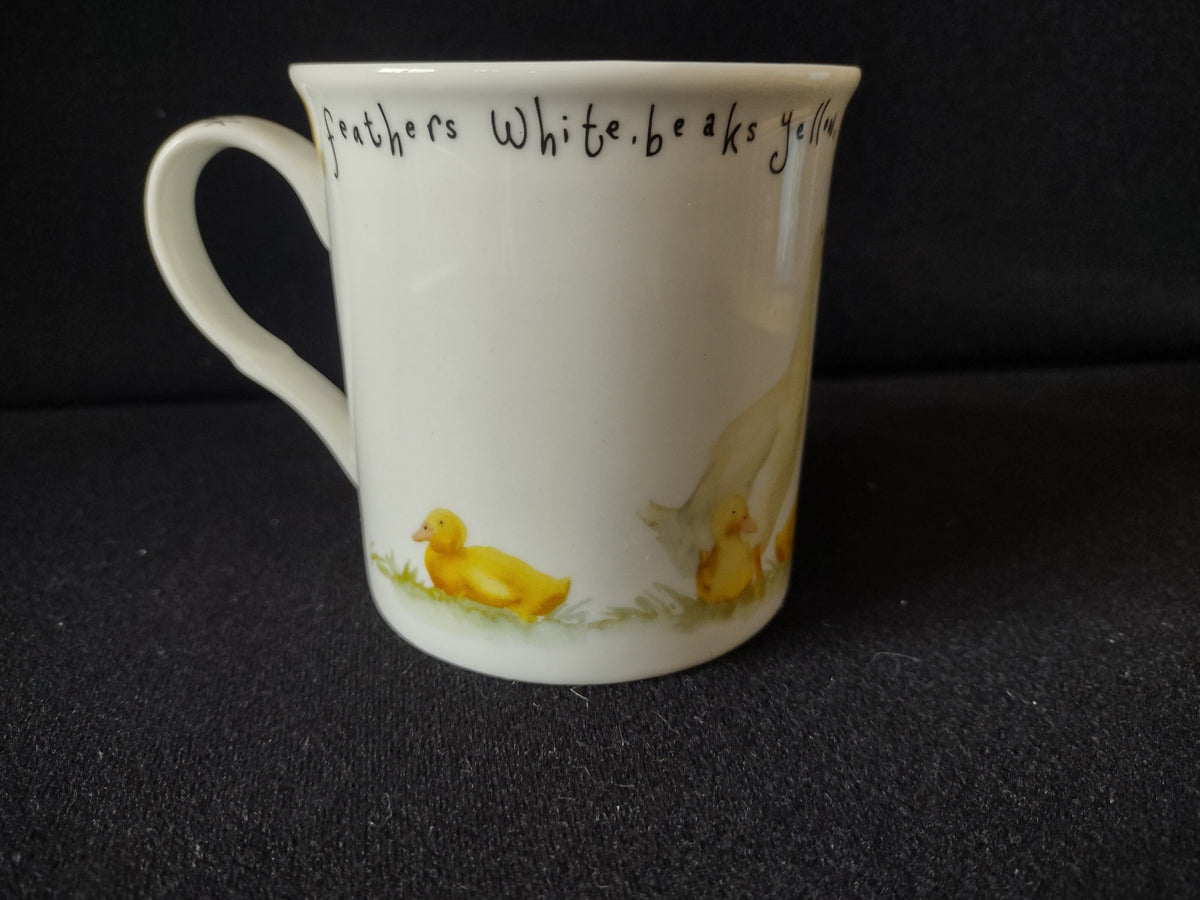 Interior rim with feathers white text and yellow duckling motifs