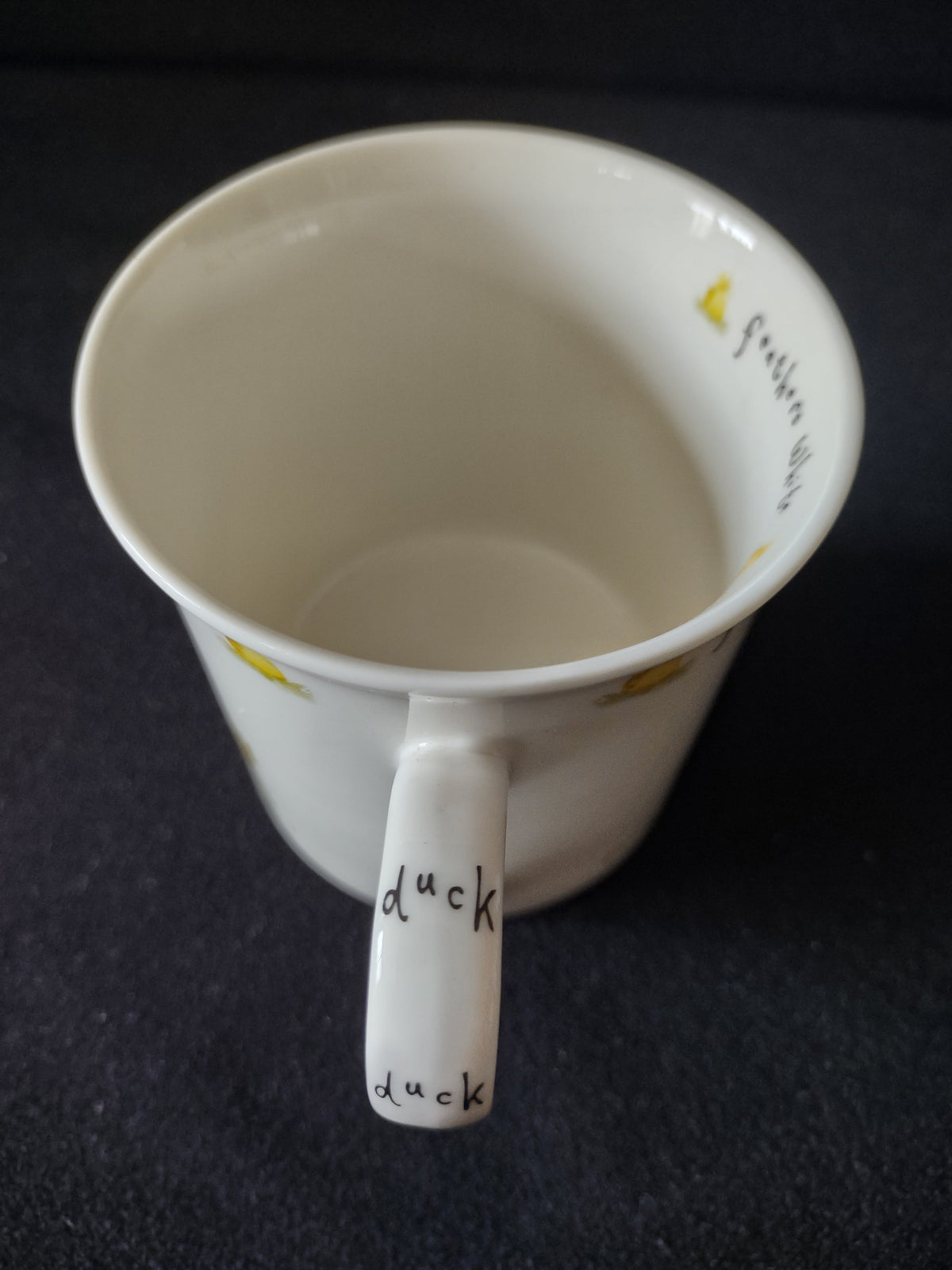 Handle inscribed with duck duck
