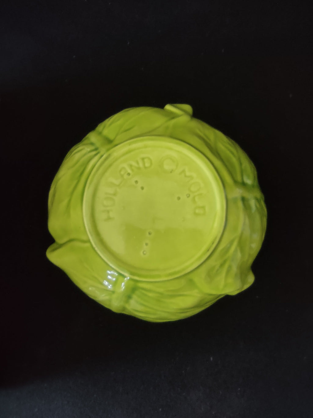 Holland Mold cabbage leaf ceramic bowl - opposite side view showing cream interior
