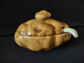 Atlantic Mold potato bowl interior view showing white glazed inside and wavy tan rim