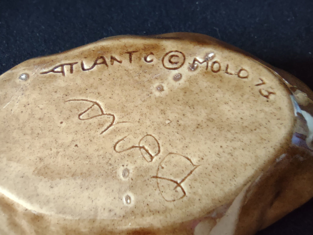 White ceramic spoon included with Atlantic Mold potato bowl