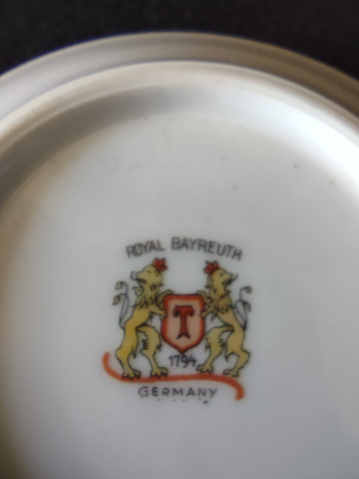 Royal Bayreuth orange saucer back showing crest backstamp
